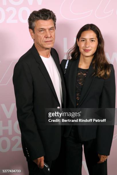 Marc Lavoine and his wife Line Papin attend the Etam Live Show - Womenswear Spring/Summer 2021 show as part of Paris Fashion Week on September 29,...