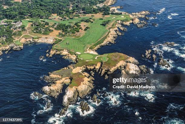 An aerial view of the 16th hole at the Cypress Point Club golf course during July 1997 in Pebble Beach, California. The 16th green is located on the...