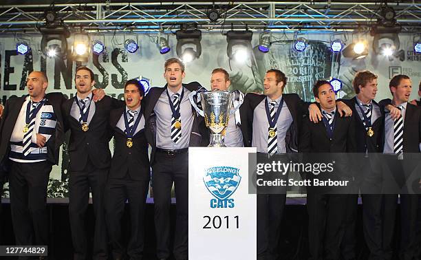 The Geelong Cats arrive with the Premiership Cup after the 2011 AFL Grand Final match between the Collingwood Magpies and the Geelong Cats at...