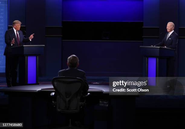 President Donald Trump and Democratic presidential nominee Joe Biden participate in the first presidential debate moderated by Fox News anchor Chris...