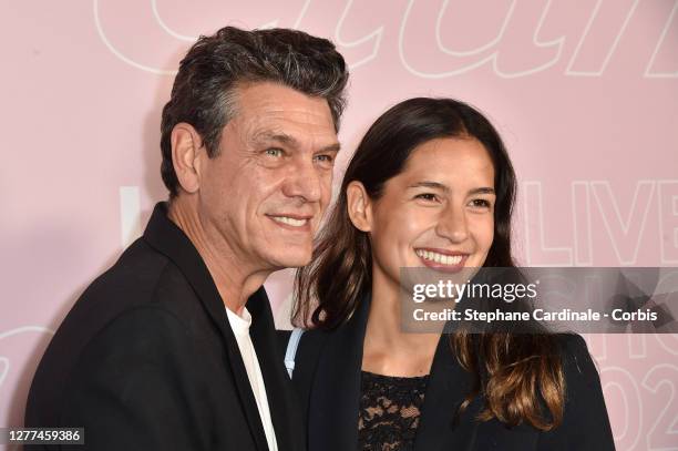 Singer Marc Lavoine and wife Line Papin attend the Etam Womenswear Spring/Summer 2021 show as part of Paris Fashion Week on September 29, 2020 in...