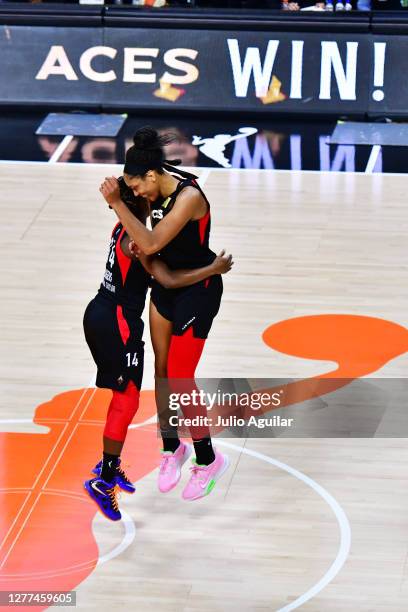 Sugar Rodgers and A'ja Wilson of the Las Vegas Aces celebrate after defeating the Connecticut Sun 66-63 to advance to the WNBA finals following Game...