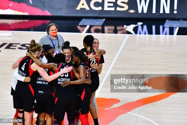 The Las Vegas Aces celebrate after defeating the Connecticut Sun 66-63 to advance to the WNBA finals following Game Five of their Third Round playoff...