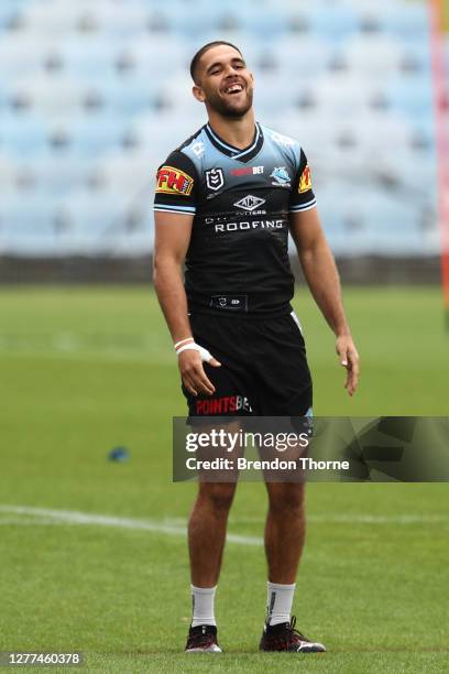 William Kennedy shares a joke with a team mate during a Cronulla Sharks NRL training session at PointsBet Stadium on September 30, 2020 in Sydney,...