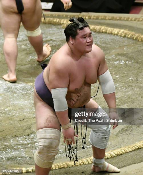 Terunofuji reacts after his defeat by Onosho on day twelve of the Grand Sumo Autumn Tournament at Ryogoku Kokugikan on September 24, 2020 in Tokyo,...