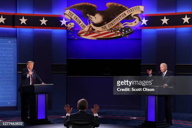 President Donald Trump and Democratic presidential nominee Joe Biden participate in the first presidential debate moderated by Fox News anchor Chris...