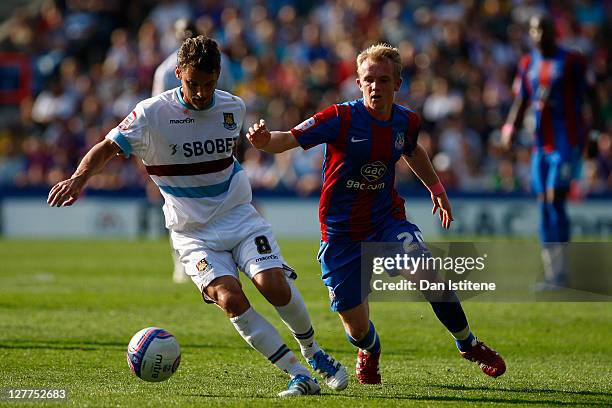 Jonathan Williams of Crystal Palace in action against David Bentley of West Ham during the npower Championship match between Crystal Palace and West...