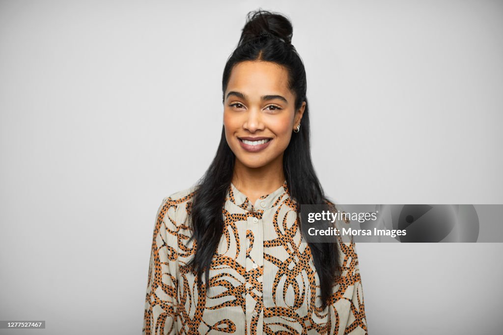 Happy African American Female CEO Wearing Printed Blouse.