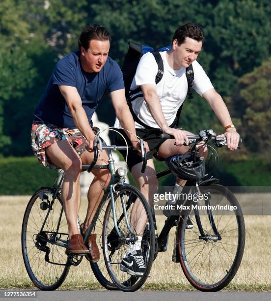 Leader of the Conservative Party David Cameron and Shadow Chancellor of the Exchequer George Osborne seen cycling through Hyde Park on July 19, 2006...