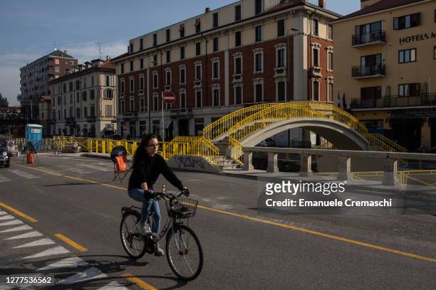 Cyclist rides past the building site of a bike lane part of VenTo, a 679 km cycle path linking Venice to Turin and other major cities of Northern...