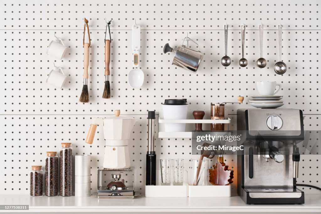 Espresso Coffee Maker and Accessories on Pegboard
