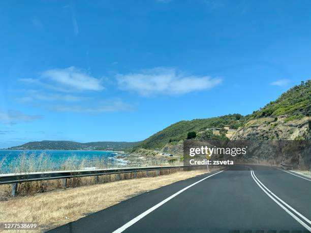 driving on the great ocean road, australia - great ocean road stock pictures, royalty-free photos & images