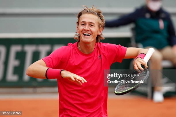 Sebastian Korda of The United States of America celebrates after winning match point during his Men's Singles second round match against John Isner...