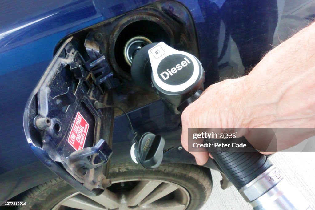 Putting diesel into car
