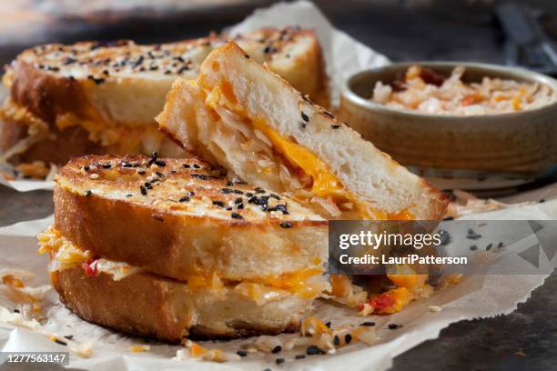 spicy korean kimchi grilled cheese sandwich's - sourdough bread stock pictures, royalty-free photos & images