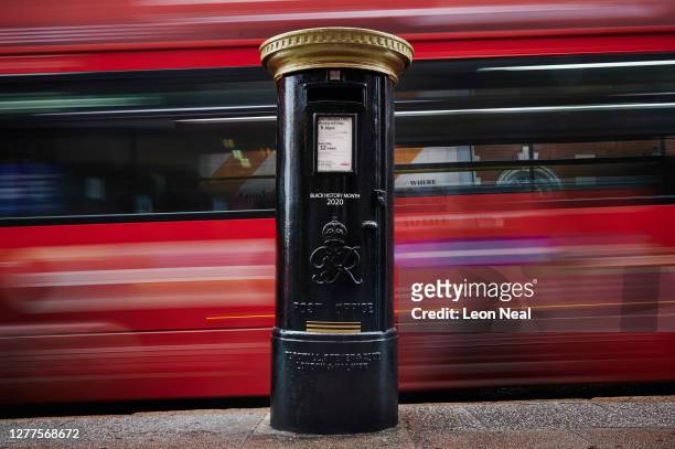 One of four postboxes across the United Kingdom to be painted black to honour black Britons as seen here in Brixton on September 30, 2020 in London,...