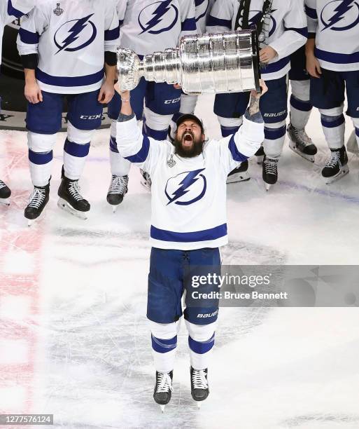 Zach Bogosian of the Tampa Bay Lightning skates with the Stanley Cup following the series-winning victory over the Dallas Stars in Game Six of the...