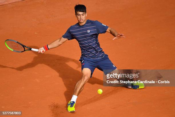 Mackenzie McDonald of the United States in action during his Men's Singles second round match against Rafael Nadal of Spain on day four of the 2020...
