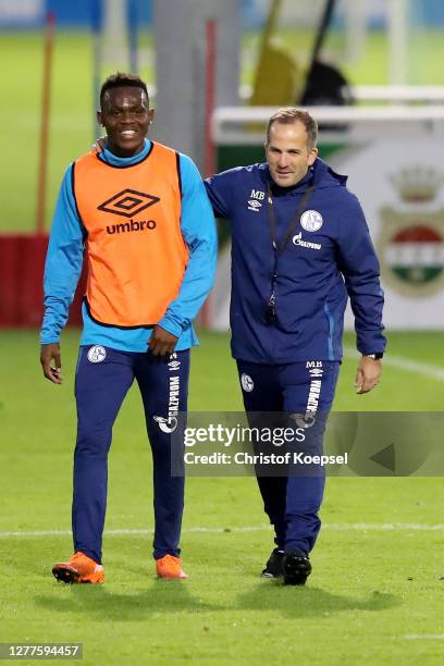 Rabbbi Matondo and head coach Manuel Baum attend the training session of FC Schalke 04 at Parkstadion on September 30, 2020 in Gelsenkirchen, Germany.