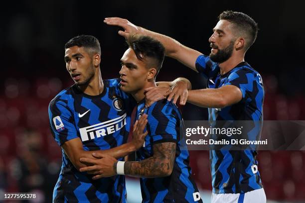 Lautaro Martínez of FC Internazionale celebrate with his teammates after scoring a goal during the Serie A match between Benevento Calcio and FC...