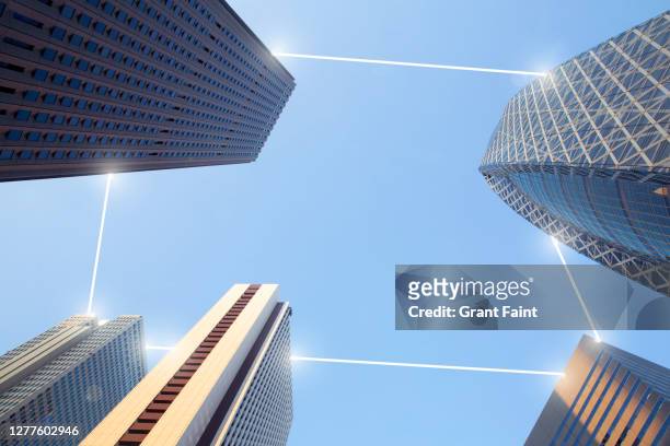 composite image:view of office towers in city centre - comps foto e immagini stock