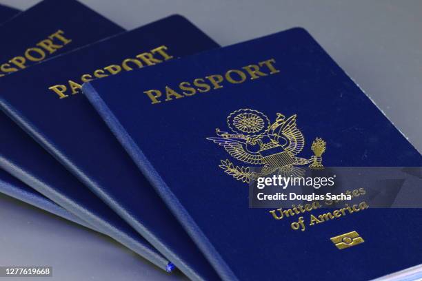 multiple united states of america passports - passport stock pictures, royalty-free photos & images