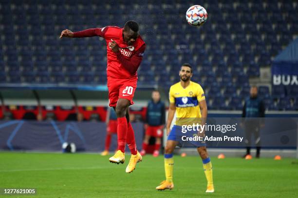 Patson Daka of RB Salzburg scores his sides third goal during the UEFA Champions League Play-Off second leg match between RB Salzburg and Maccabi...