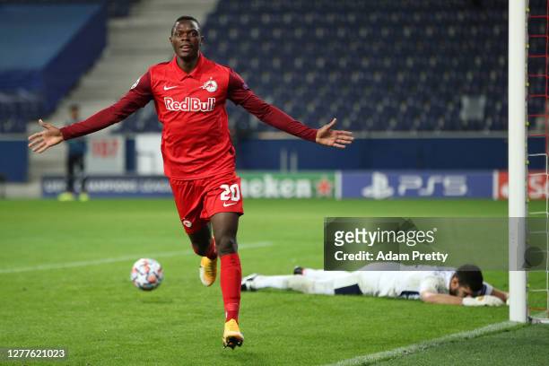 Patson Daka of RB Salzburg celebrates after scoring his sides third goal during the UEFA Champions League Play-Off second leg match between RB...