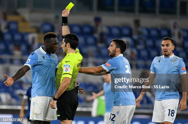 Referee Fabio Maresca shows a yellow card at Felipe Caicedo of SS Lazio during the Serie A match between SS Lazio and Atalanta BC at Stadio Olimpico...