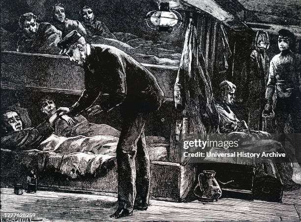 Engraving depicting a scene onboard an Irish emigrant ship bound for North America during the potato famine of the 1840s. The emigrants were so...