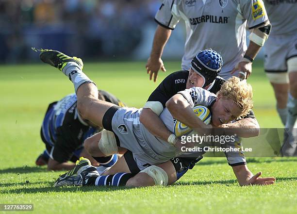 Billy Twelvestrees of Tigers is tackled by Ben Skirving of Bath during the AVIVA Premiership match between Bath and Leicester Tigers at Recreation...