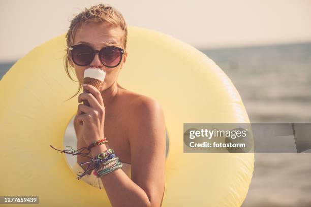 ice cream, sea and pretty woman - woman ice cream stock pictures, royalty-free photos & images