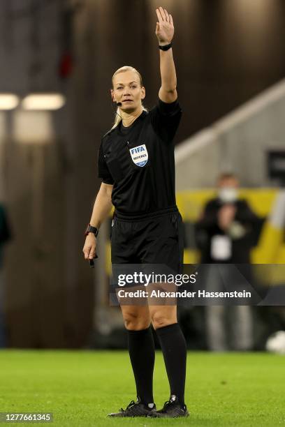 Referee Bibiana Steinhaus gestures during the Supercup 2020 match between FC Bayern Muenchen and Borussia Dortmund at Allianz Arena on September 30,...