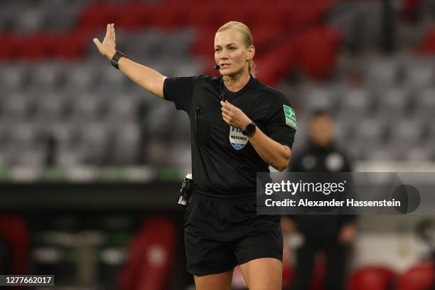 Referee Bibiana Steinhaus gestures during the Supercup 2020 match between FC Bayern Muenchen and Borussia Dortmund at Allianz Arena on September 30,...