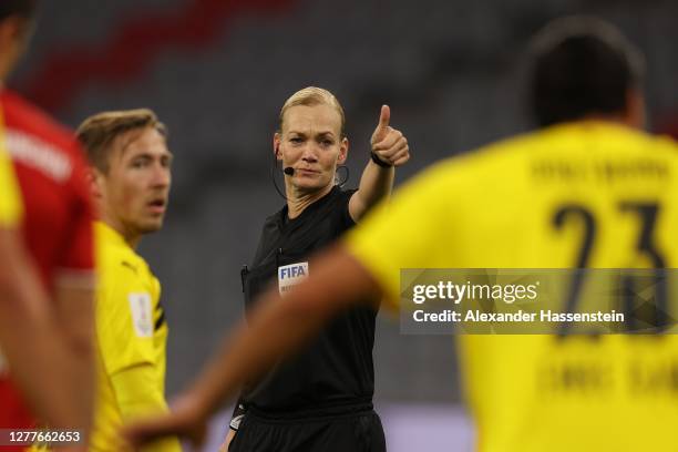 Referee Bibiana Steinhaus gestures during the Supercup 2020 match between FC Bayern Muenchen and Borussia Dortmund at Allianz Arena on September 30,...