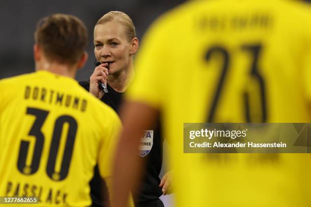 Referee Bibiana Steinhaus gestures during the Supercup 2020 match between FC Bayern Muenchen and Borussia Dortmund at Allianz Arena on September 30,...