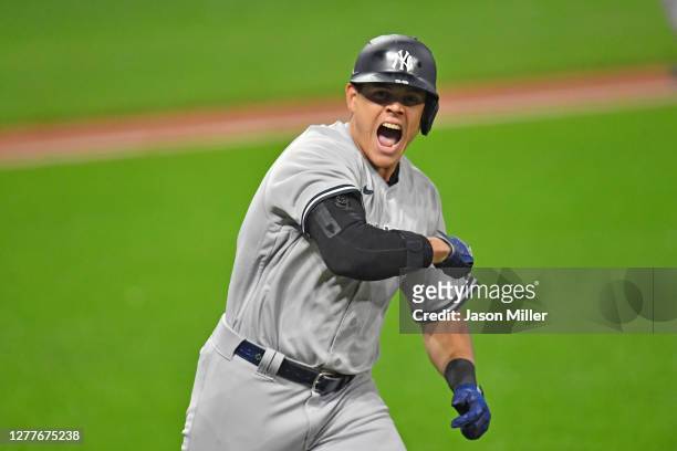 Gio Urshela of the New York Yankees celebrates after hitting a grand slam during the fourth inning of Game Two of the American League Wild Card...