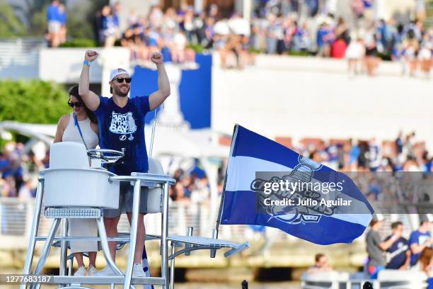 Kevin Shattenkirk of the Tampa Bay Lightning celebrates from his boat at the Tampa Bay Lightning Victory Rally & Boat Parade on the Hillsborough...