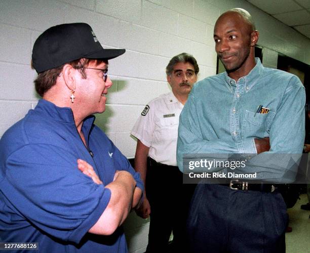 Star Clyde "The Glide" Drexler and Elton John attend Elton John & Billie Jean King Smash Hits at The Summit in Houston, Texas September 12, 1996...