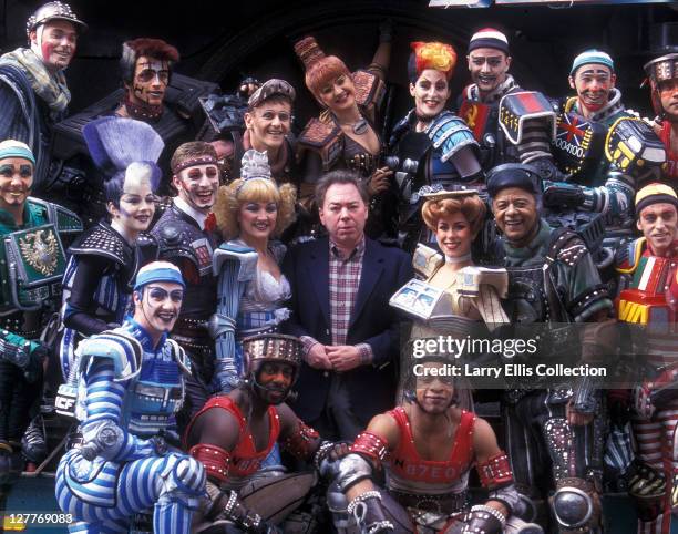 English composer Andrew Lloyd Webber with the cast of his stage musical 'Starlight Express', circa 1984.