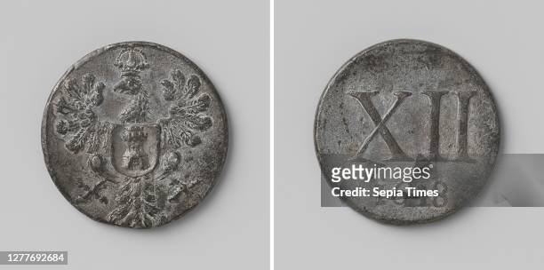 Vro Gereedschap from Middelburg, token worth 12 pence, Tin token. Obverse: crowned eagle with wings spread and coat of arms for chest. Reverse: Roman...