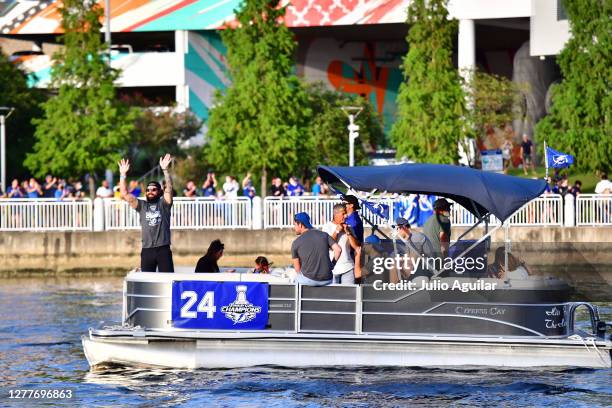 Zach Bogosian of the Tampa Bay Lightning waves to fans at the Tampa Bay Lightning Victory Rally & Boat Parade on the Hillsborough river on September...