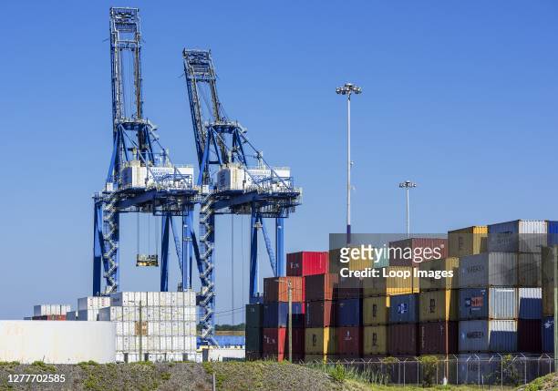 Cargo cranes and shipping containers at Wilmington in North Carolina.