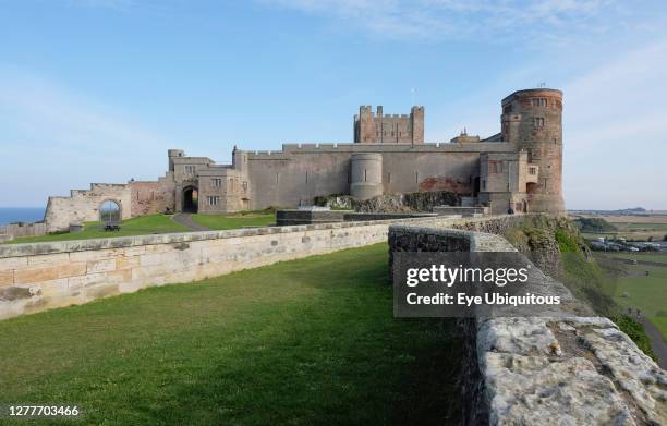 England, Northumberland, Bamburgh Castle on rocky outcrop.