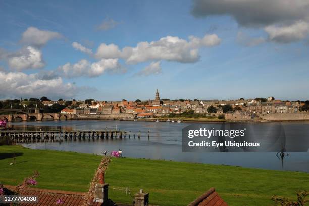 England, Northumberland, Berwick on Tweed, View across river with the town skyline beyond.