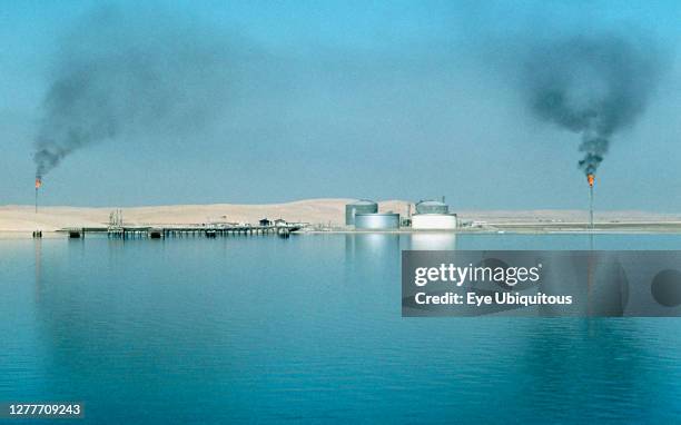 Qatar, General, Gas oil installation on the coast at the edge of the desert.