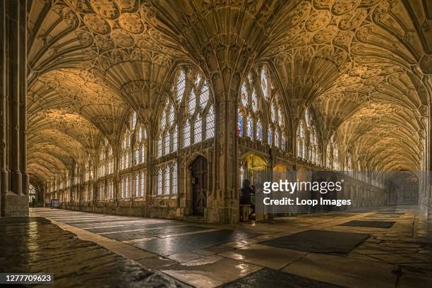 The cloisters of Gloucester Cathedral have a fan vaulted ceiling dating from the 14th Century.