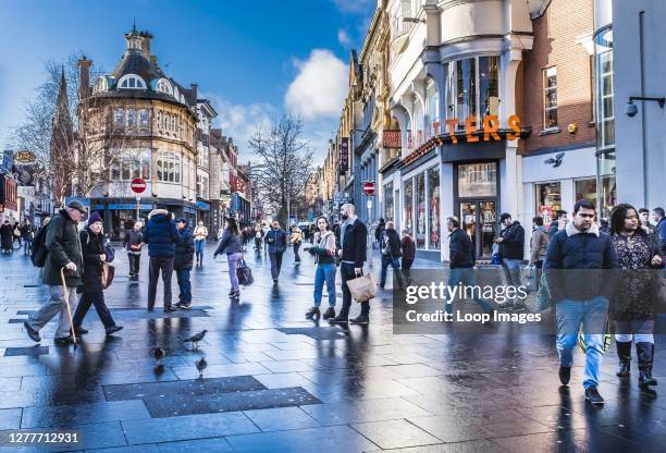 Shoppers in Leicester city centre.