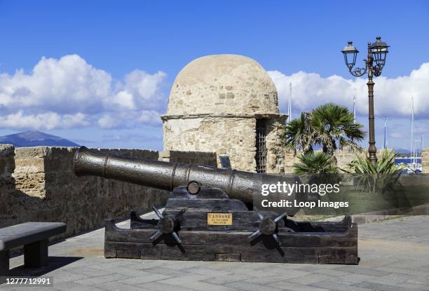 Historic watchtower and cannon on the Bastioni Pigafetta rampart at Alghero in Sardinia.
