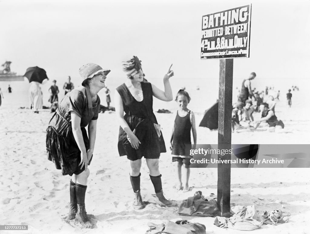 Two Women reading Sign on Beach, Lincoln, Park, Chicago, Illinois, USA, American National Red Cross Collection, 1919